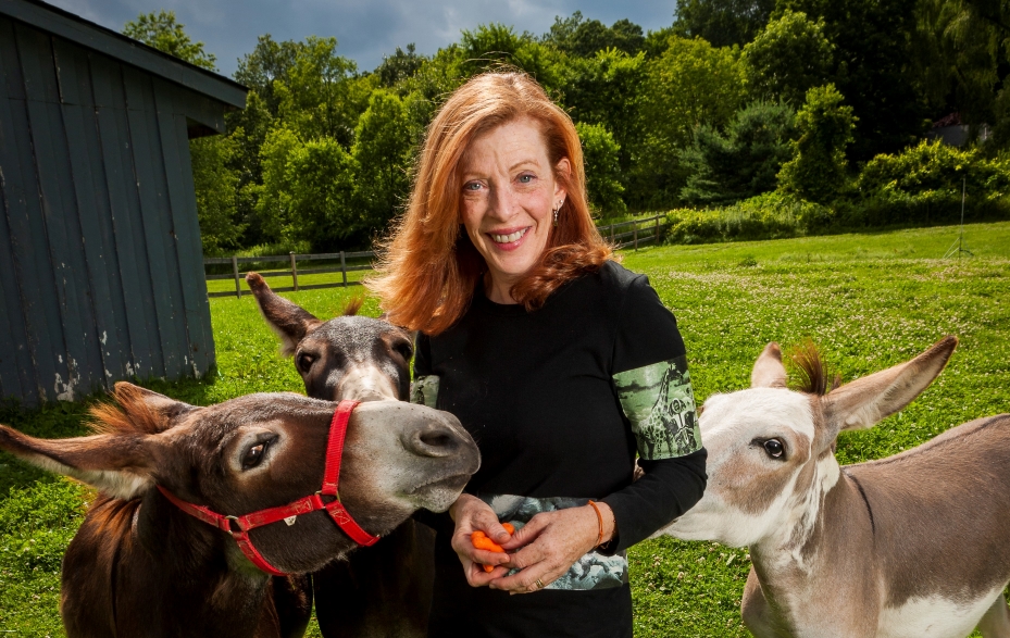 Susan Orlean feeding animals